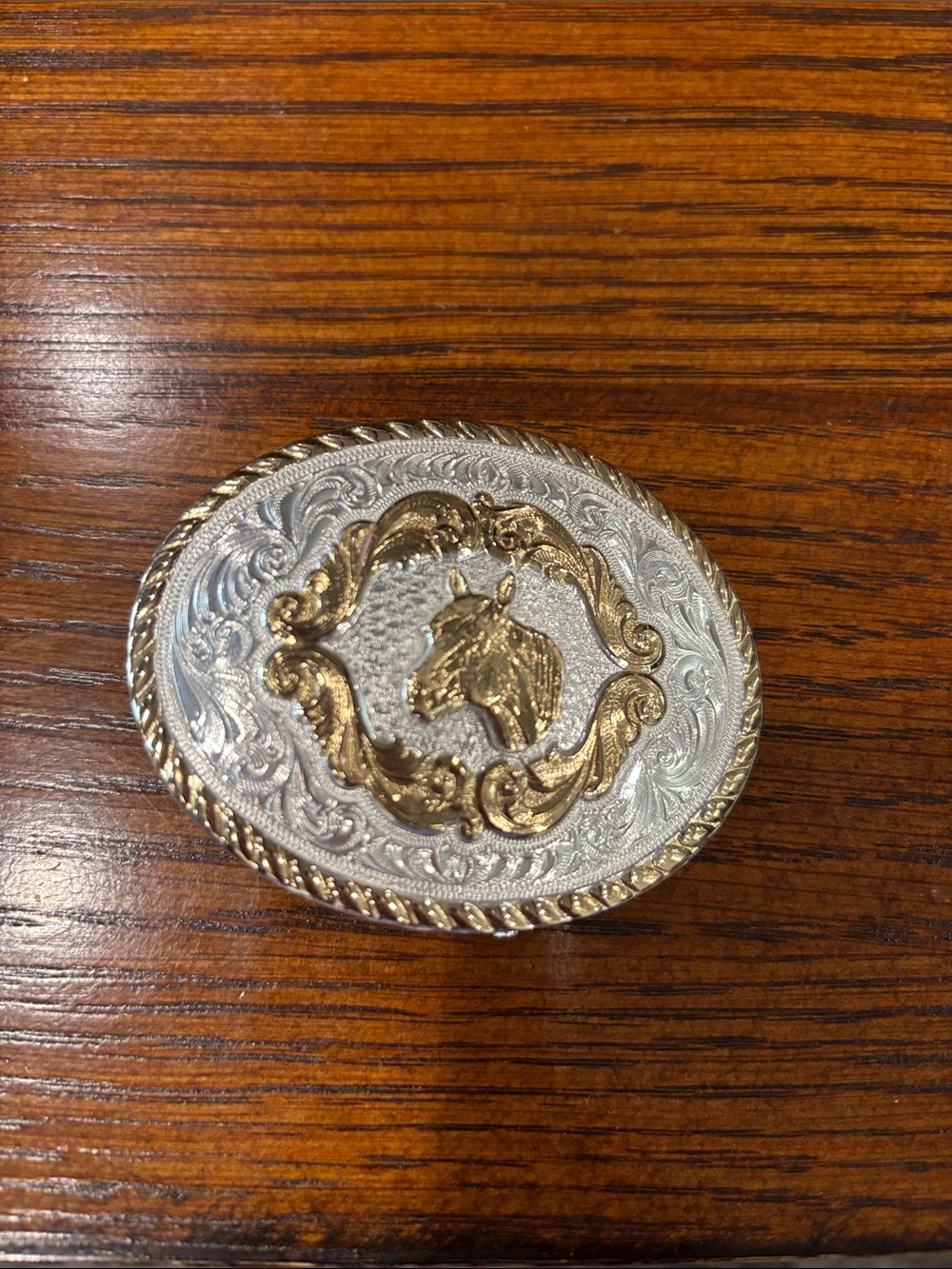 Montana Silversmiths Gold and Silver Horse Head Oval Buckle